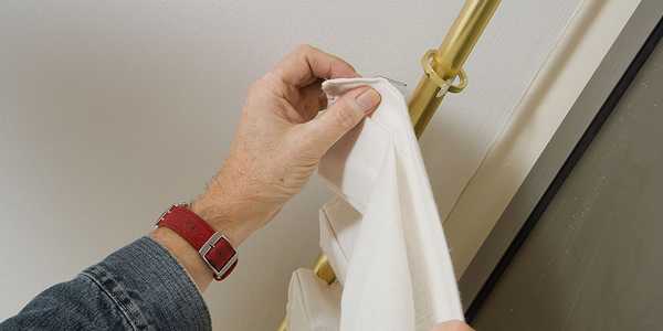 How to put up a curtain pole.